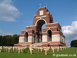 Thiepval Memorial to the Missing, with French graves of the Anglo-French Cemetery in the foreground.