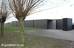 Tunnel showing archive film leading visitors along the path to Langemark cemetery.