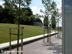 Exit from the Visitors Centre, turning right to follow the pedestrian route to Tyne Cot Cemetery and Memorial.